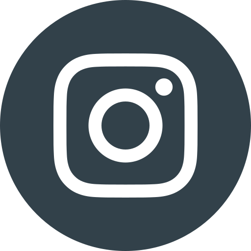 Black circle with white camera icon representing Instagram logo.